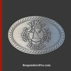 Oval antique silver belt buckle featuring the Yukon First Nations Wildfire insignia in the center.