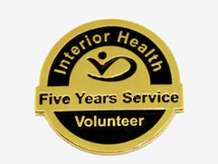 Gold and black Health 5-Year Service lapel pin celebrating dedication and achievement.