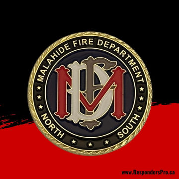 Gold, white, and red round challenge coin featuring the letters "MFD" prominently displayed in the center.