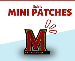 Bright red embroidered mini patch shaped as letter M on white and light blue.