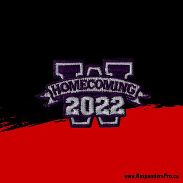 Mini embroidered W patch for homecoming in dark purple and white.
