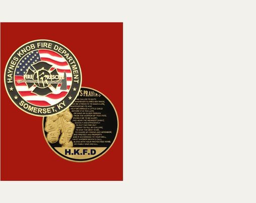 Front of a round, gold Haynes Knob Fire Department challenge coin featuring a red Maltese cross, crossed fire axes, and the American flag. The reverse side shows a 3D gold firefighter kneeling with the text of the Firefighter's Prayer.