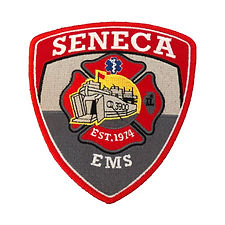 Embroidered EMS patch with Maltese Cross in red, yellow and white.