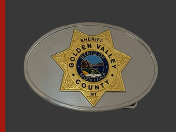 Golden Valley County Sheriff belt buckle with silver and gold dual finish, featuring a gold sheriff star and state seal.