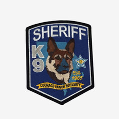 Sheriff K9 embroidered patch featuring a detailed police dog, a sheriff star, designed in shades of brown, gold, and blue.