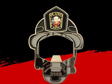 Fire helmet-shaped challenge coin bottle opener featuring a Maltese cross and insignia design.