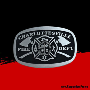 An antique silver rectangular belt buckle with rounded corners. In the center is a Maltese Cross with two axes crossed behind it.