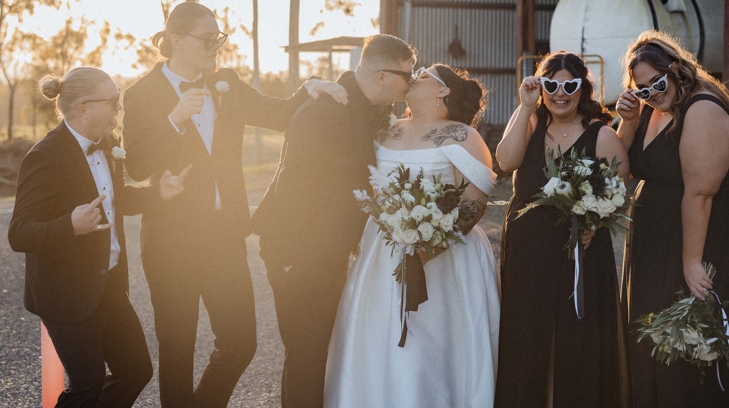 Bridal party having fun in the golden hour