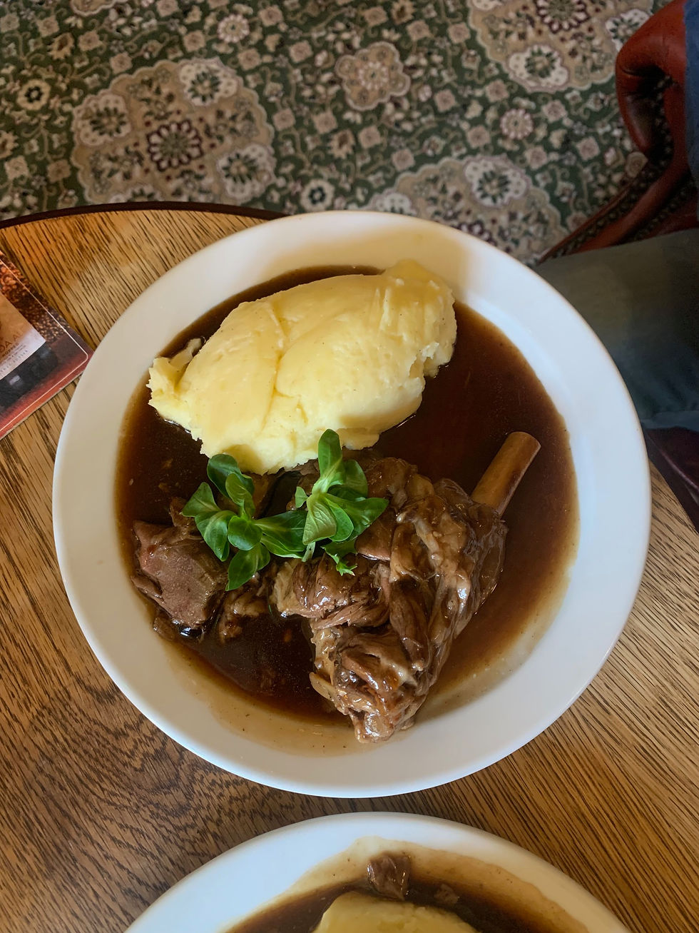 Lamb shank with creamy mashed potato.