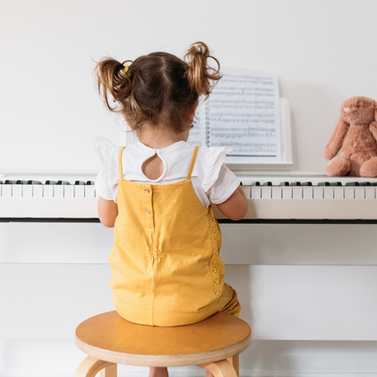 Little girl at the piano