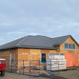 side view of a house under construction 