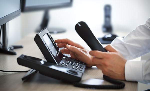 an employee working with internet phone