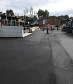 vehicle crossing with  new asphalt