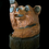 Thumbnail: Chainsaw-carved waving bear sculpture — rustic cabin décor piece handcrafted from pine with natural wood grain detail.