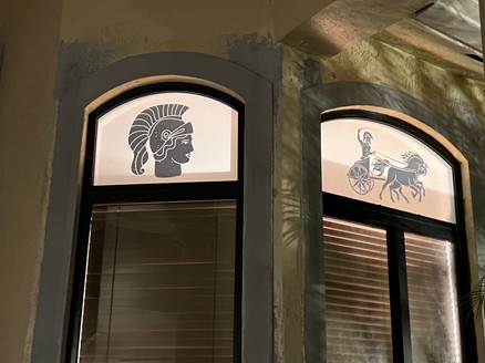 Custom Decorative window film with Roman soldier. Transom application with medium opacity for contrast.