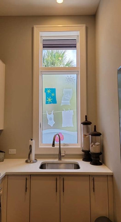 Custom Decorative film design with beach towels in colored frost and white frost, Flip-flops in colored frost and overall a clear frost backgorund.