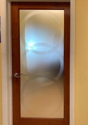 Custom Decorative clear frost design. circle created with optical trick using mini lines with opposing 45 degrees directions.