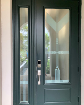 decorative window film design as a tribute to Frank Lloyd Wright love of glass design. Sidelight design created to fit specifically the dimension of this customer main door design.