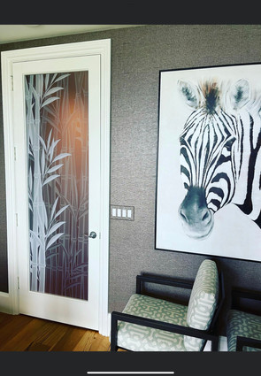 Bamboo door design in two tones to give the impression of depth. Various level of white frost and clear frost create the overall effect.