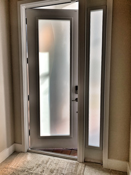 Decorative Design with Sidelight, the decorative film has tow level of frost. on one side a White 60%, on the other we have thin lines of white frost and clear frost one after the other. The creates a wavy flow with two different opacity level that will change the light inside the home during daylight hours.