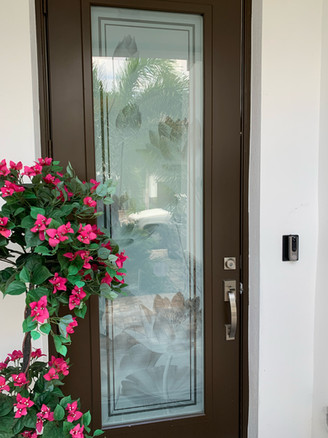 Lotus main door design with white frost background, double clear border and lotus flowers in shaded white frost.