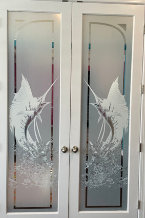 Custom Decorative glass interior door for office with Marlin design. Requested specifically by customer who is a passionate fisherman.