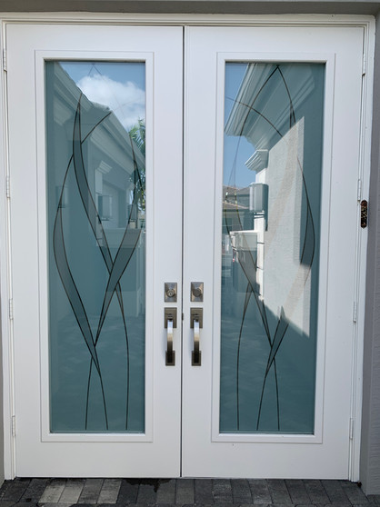 Change on an existing decorative film design to meet customer's requests. main door design with textured frost and etched feeling.