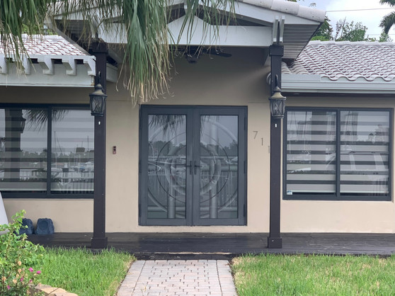 Custom Decorative Art Decò design in this decorative front door. Various level of white frost achieved through shading.