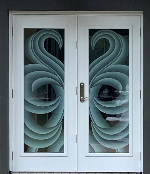Decorative front door design in various shades of white frost. The mirrored design adds an element of elegance and importance to the door.