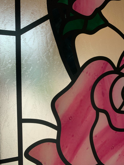 Stained glass design in a decorative window film for a double entrance door. Created to be almost exact to the original doors.