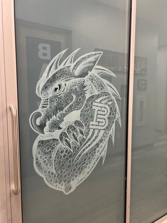 Decroative Custom frost pattern with dragon logotype for Barvis. A 20% white frost background with white frosted lines for the logo.