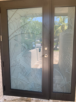 Nature decorative design expanded to cover the large sidelight.