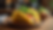 Close-up view of a taco filled with sushi ingredients