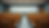 Eye-level view of a university lecture hall with empty seats and a clear timetable on the wall