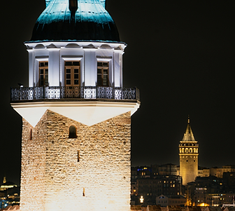 Galata Tower illuminated at night in Istanbul historic skyline view