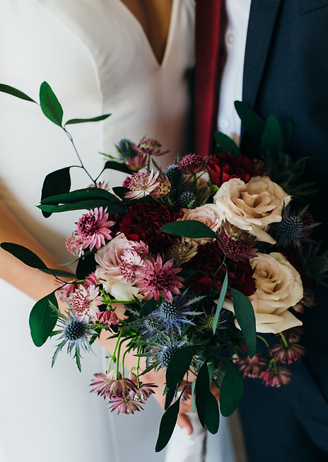 Bride with dark flowers