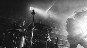 Indie Rock fans will love Voodoo Bloo's live performances. This is a photo from a gig.