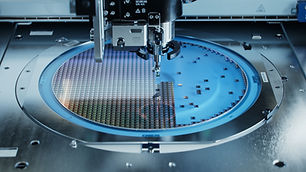Semiconductor Packaging Process. Computer Chips are being Extracted by a Pick and Place Ma