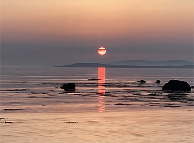 Sunset over sea at Tayinloan beach