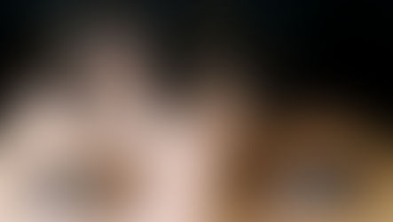 A woman gazing into technology