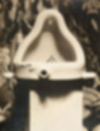a urinal turned upside down and signed R. Mutt