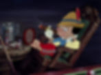 A puppet smokes a cigar while leaning back in a chair