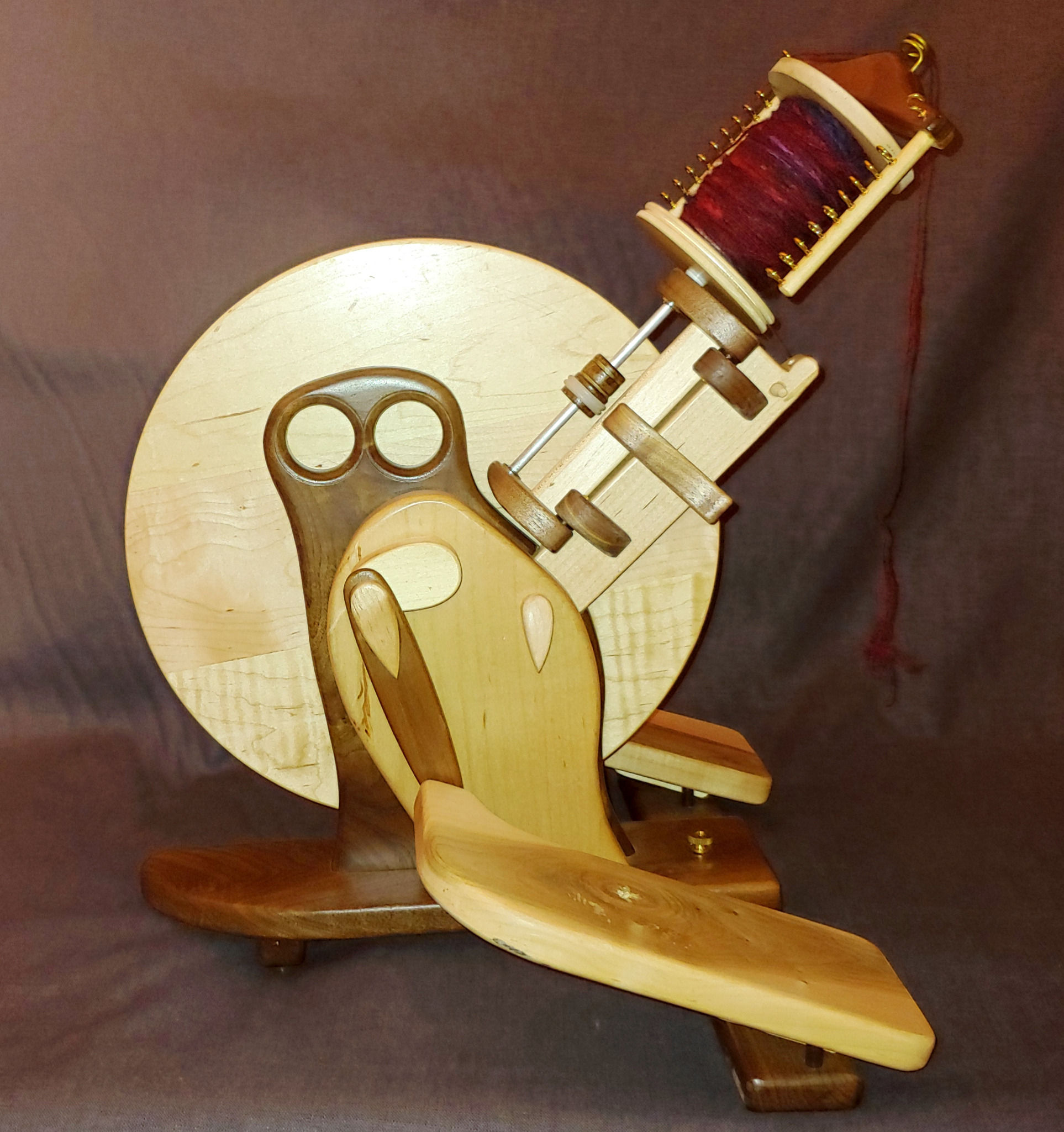 Capricorn Wheel in Walnut Body and Maple Wing