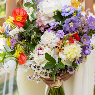 June bridal with bright poppy accents