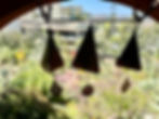 Bells with clangers hiding hotel parking lot.