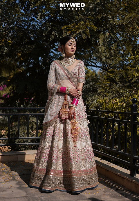A blissful bride  embracing on her wedding day