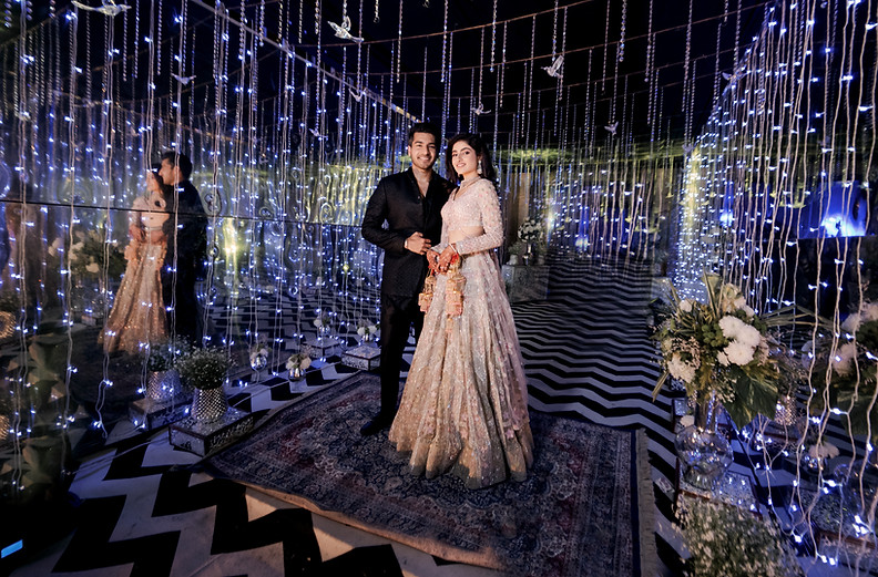 Blissful couple enveloped in the magic of Indian weddings.