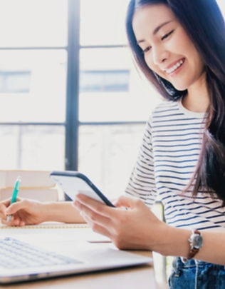 Young pretty female student remote worki