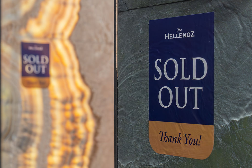 Stiker Sold Out milik Hellenoz yang tersebar di booth selama pameran.