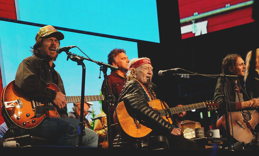 Willie Nelson with sons Lukas (left) and Micah. Photo by Bob Benenson